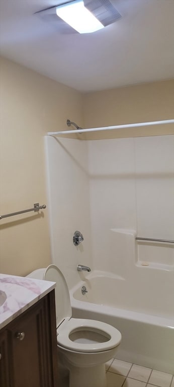 full bathroom with vanity, toilet, washtub / shower combination, and tile patterned floors