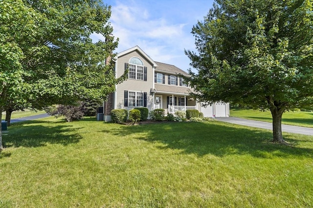 3 Spindletop Dr, Leominster, MA 01453 - view of front of house with asphalt driveway, a front lawn, and an attached garage