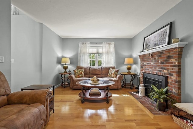 3 Spindletop Dr, Leominster, MA 01453 - living room with a brick fireplace and hardwood / wood-style floors