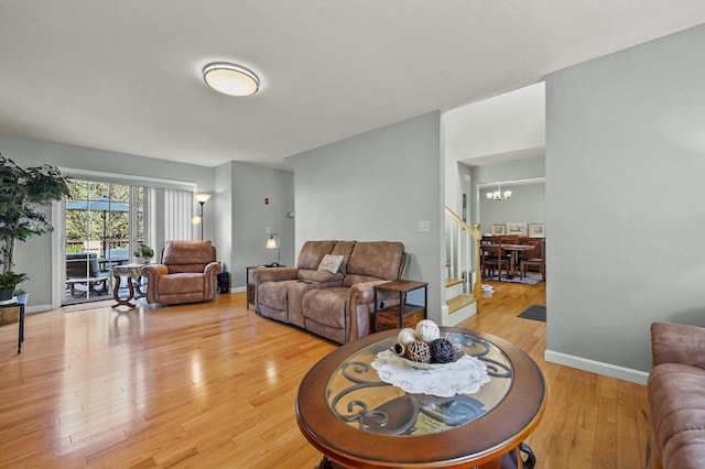 3 Spindletop Dr, Leominster, MA 01453 - living room with a chandelier and light wood-type flooring
