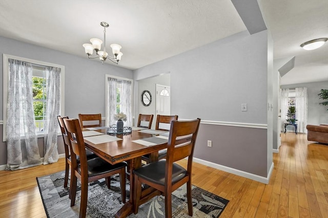 3 Spindletop Dr, Leominster, MA 01453 - dining space featuring plenty of natural light, light wood finished floors, and a chandelier