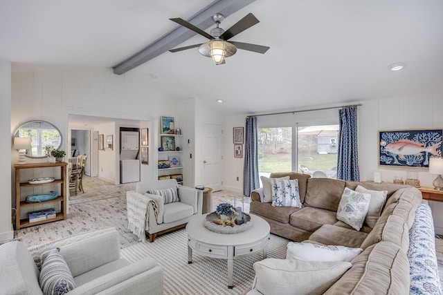 living room featuring healthy amount of natural light, ceiling fan, recessed lighting, and wooden walls