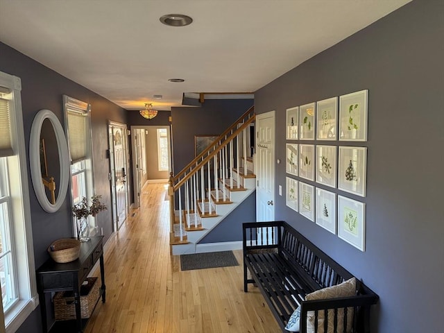 interior space featuring baseboards and hardwood / wood-style flooring