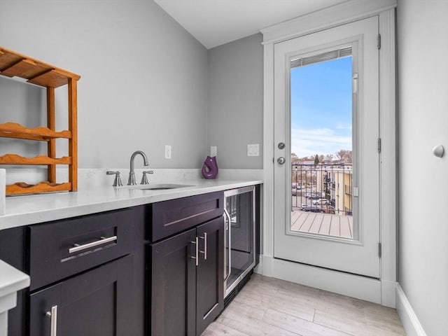 49 Coffey St Unit B, Boston, MA 02122 - bar area featuring a sink, wine cooler, and light wood finished floors