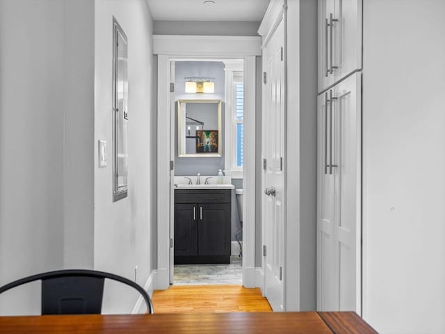 49 Coffey St Unit B, Boston, MA 02122 - corridor featuring light wood-type flooring, a sink, and baseboards