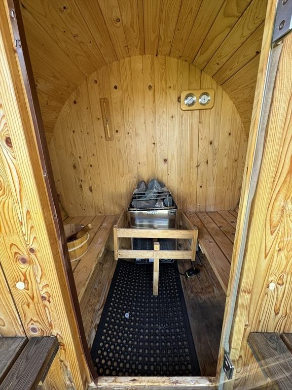 view of sauna / steam room featuring wood finished floors