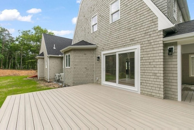 wooden deck with a yard