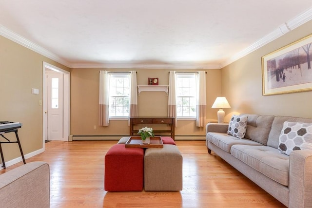 living room with ornamental molding, a baseboard heating unit, and light hardwood / wood-style flooring