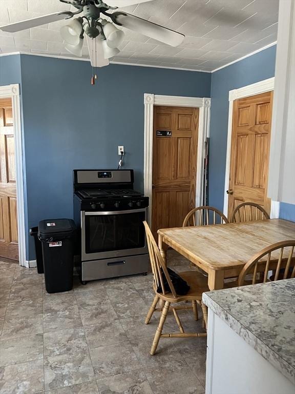 dining area featuring a ceiling fan