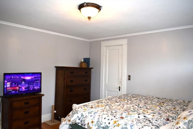 bedroom featuring ornamental molding