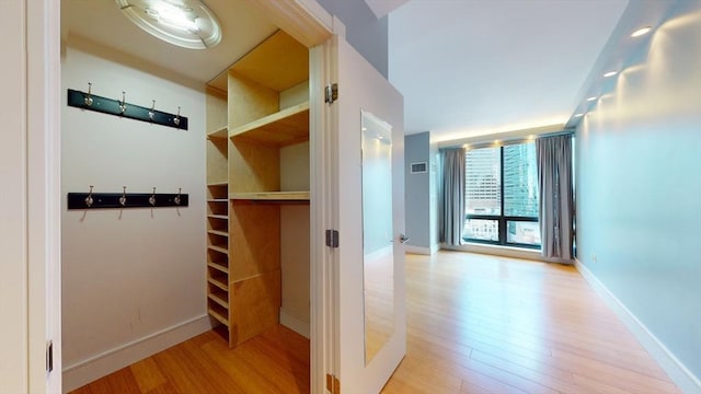 mudroom with light wood-type flooring