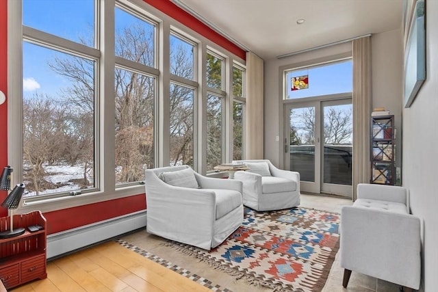 sunroom / solarium with baseboard heating