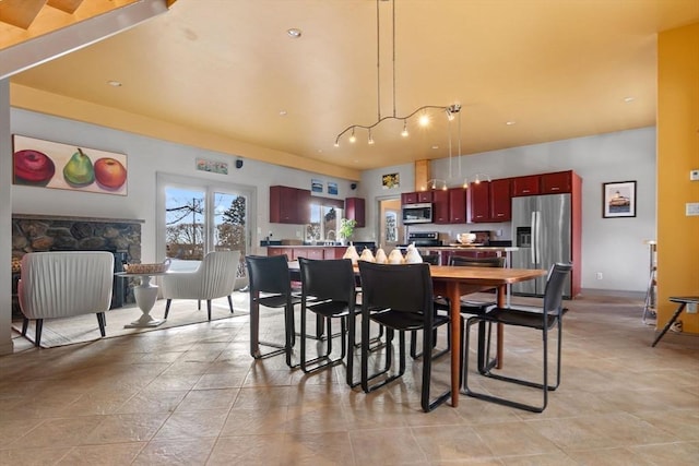 dining room featuring a fireplace