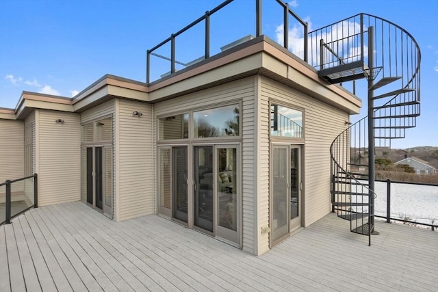 wooden deck featuring stairs