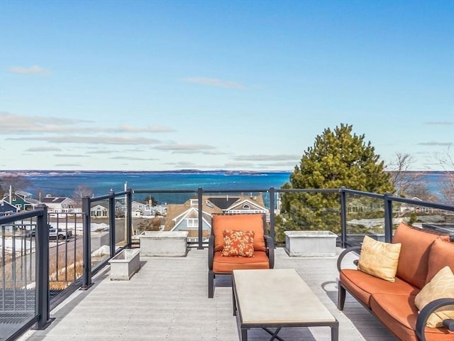 balcony featuring a water view