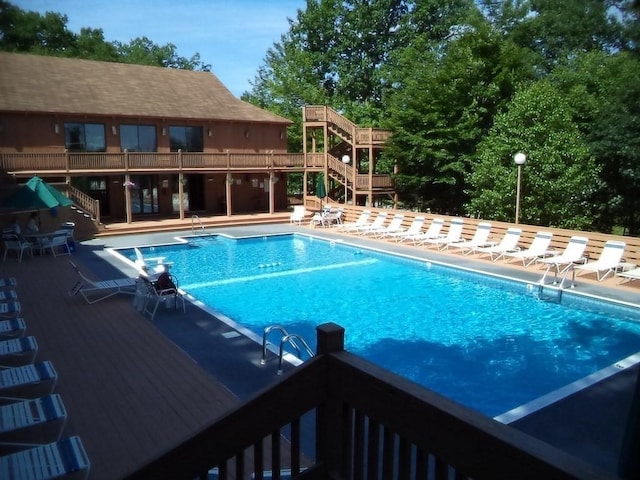 12 Perkins Ct Unit 12, Haverhill, MA 01832 - community pool featuring stairs, a patio area, and a deck
