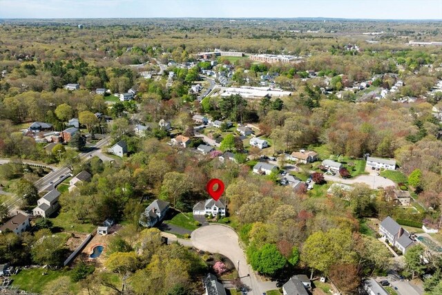 bird's eye view featuring a view of trees