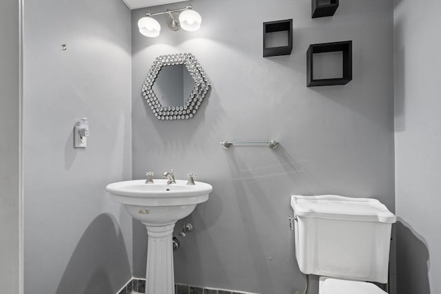 bathroom featuring toilet