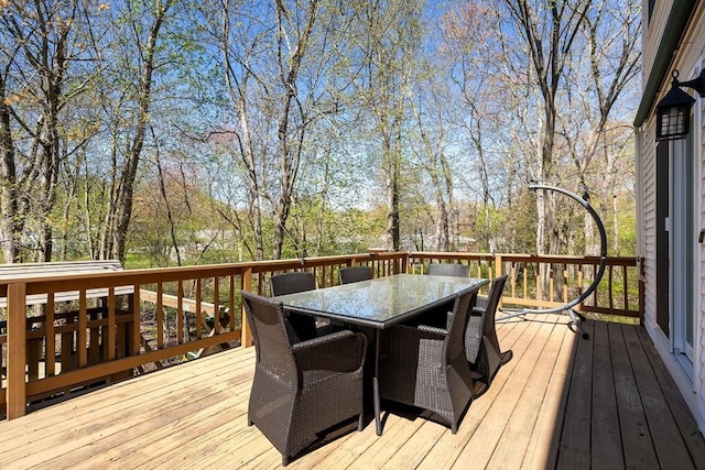 deck with outdoor dining space