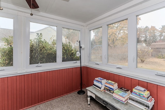 unfurnished sunroom featuring a wealth of natural light