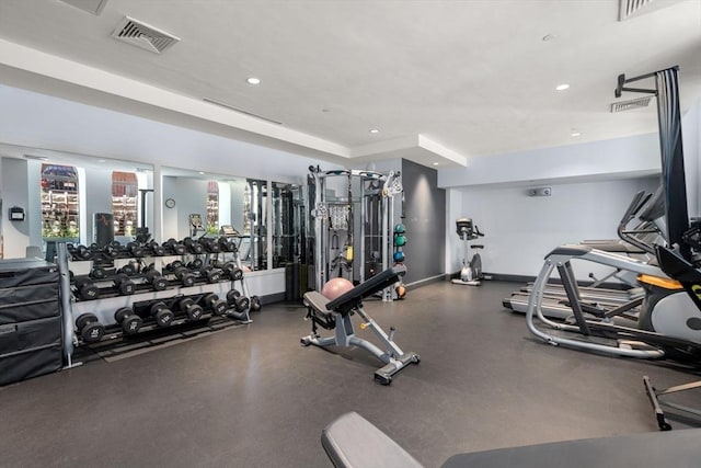 workout area with recessed lighting, visible vents, and baseboards