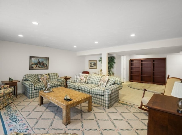 living room with recessed lighting and wood finished floors