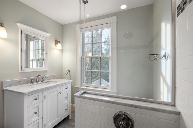 bathroom featuring vanity and plenty of natural light