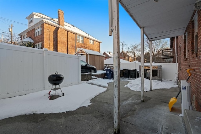 view of snow covered patio