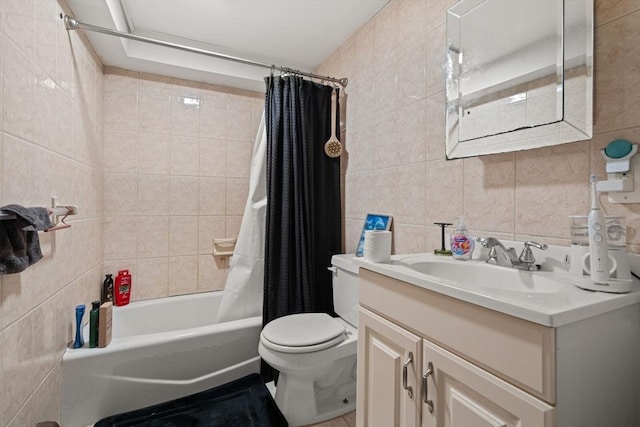 full bathroom with shower / bath combination with curtain, vanity, toilet, and tile walls