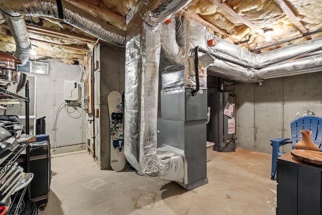 unfinished below grade area with gas water heater and heating unit