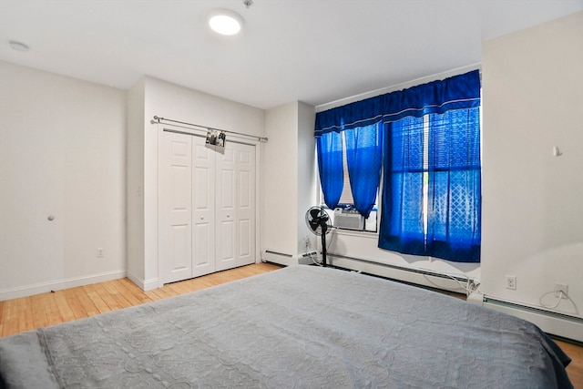 unfurnished bedroom with wood-type flooring and cooling unit