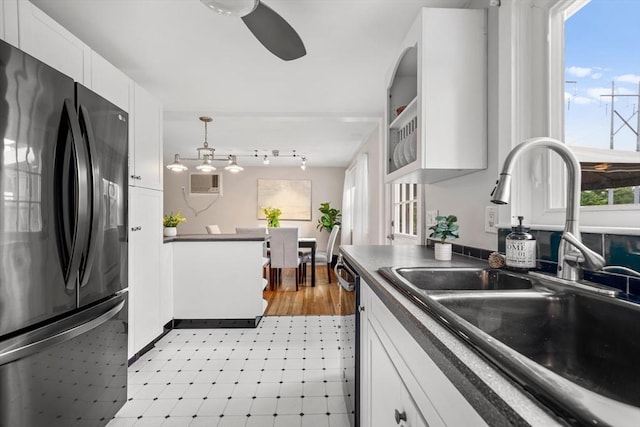 21 Wilhelmina Ave, Burlington, MA 01803 - kitchen with freestanding refrigerator, a sink, light floors, white cabinets, and dark countertops