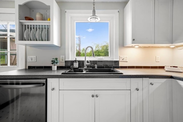 21 Wilhelmina Ave, Burlington, MA 01803 - kitchen featuring stainless steel dishwasher, a sink, white cabinets, and dark countertops