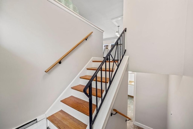 21 Wilhelmina Ave, Burlington, MA 01803 - stairway featuring a baseboard heating unit