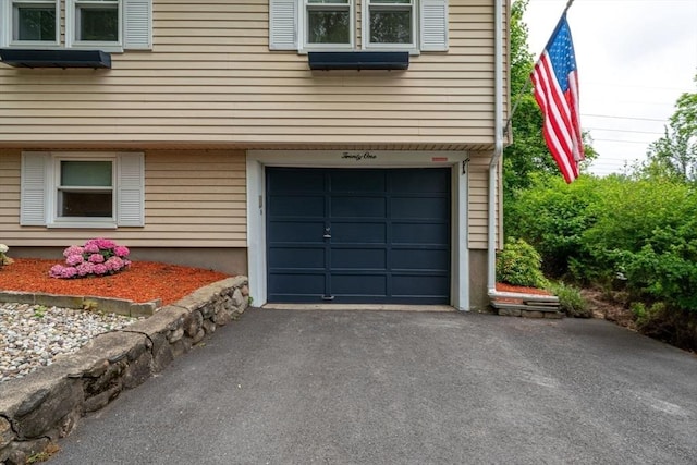 21 Wilhelmina Ave, Burlington, MA 01803 - garage with asphalt driveway