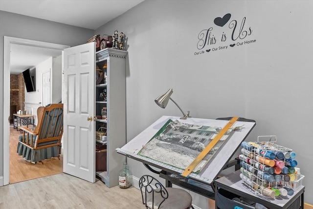 office space with wood finished floors