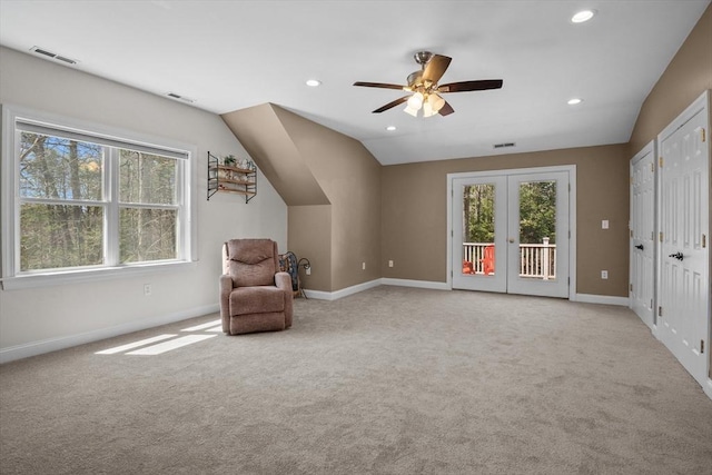 unfurnished room with plenty of natural light, carpet flooring, french doors, recessed lighting, and vaulted ceiling