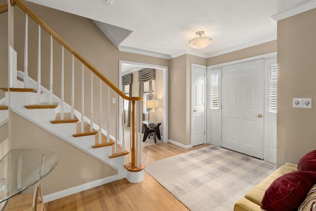 3 Jasmine Dr, Oxford, MA 01540 - entrance foyer featuring stairway, wood finished floors, ornamental molding, and baseboards