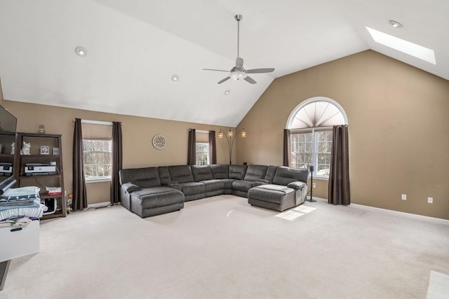 3 Jasmine Dr, Oxford, MA 01540 - carpeted living area featuring baseboards, recessed lighting, a ceiling fan, and vaulted ceiling with skylight