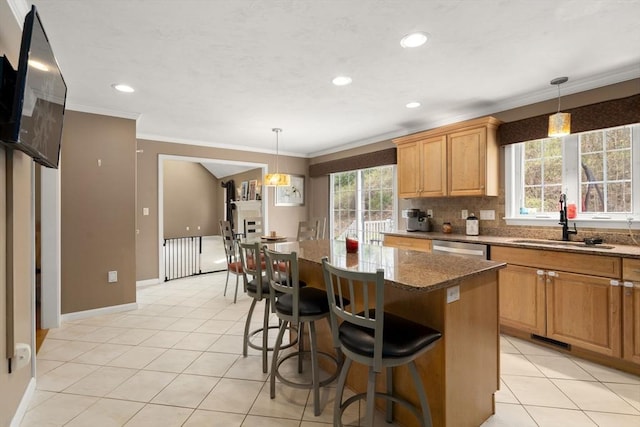 3 Jasmine Dr, Oxford, MA 01540 - kitchen featuring a center island, a healthy amount of sunlight, crown molding, and a sink