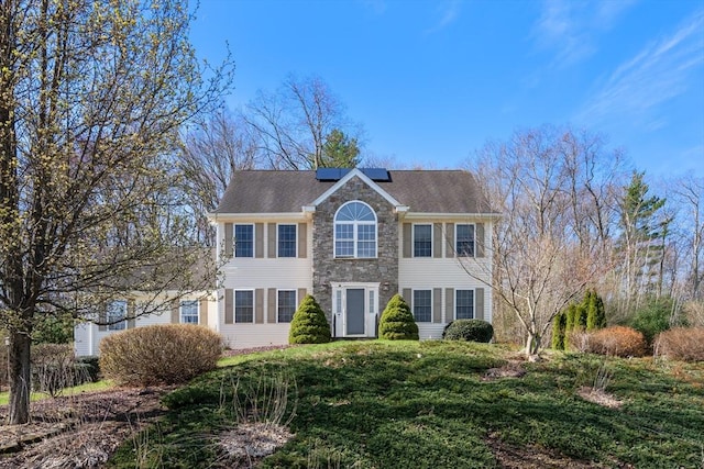 3 Jasmine Dr, Oxford, MA 01540 - colonial home with stone siding and solar panels