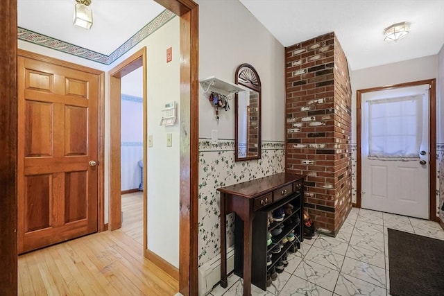 entryway featuring light wood-style floors