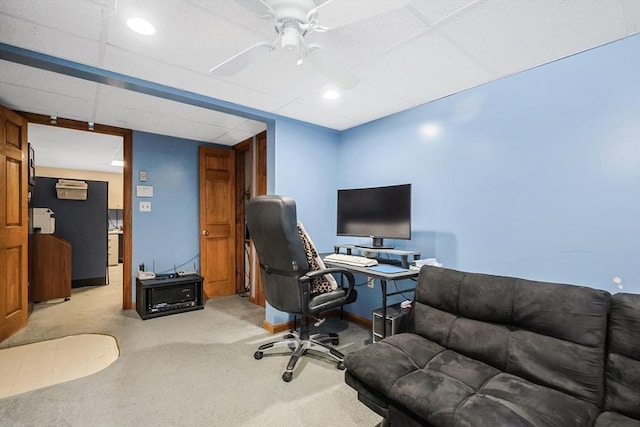 carpeted office with ceiling fan, a drop ceiling, and recessed lighting