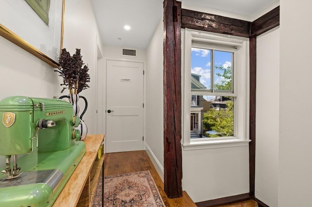 doorway to outside with hardwood / wood-style floors