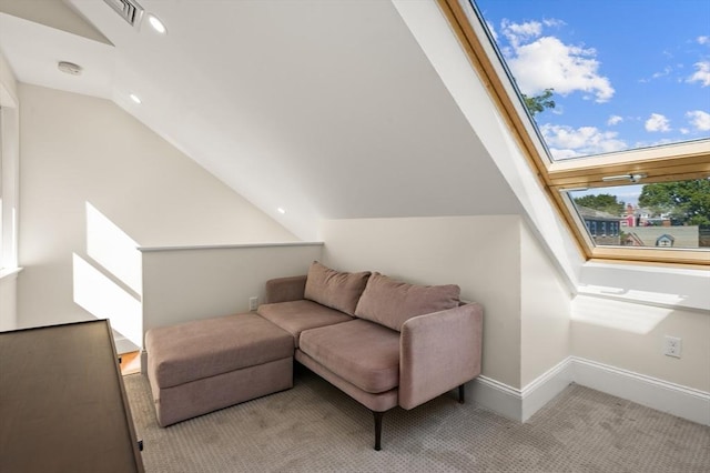 bonus room with lofted ceiling and light colored carpet