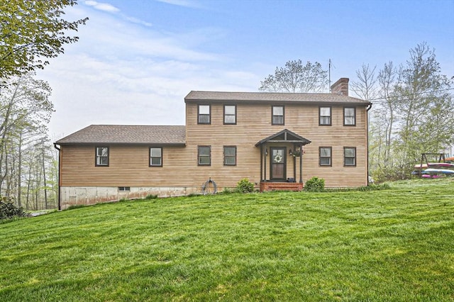 93 Lincoln Ave, Ashburnham, MA 01430 - view of front of home featuring a chimney, a front lawn, and roof with shingles