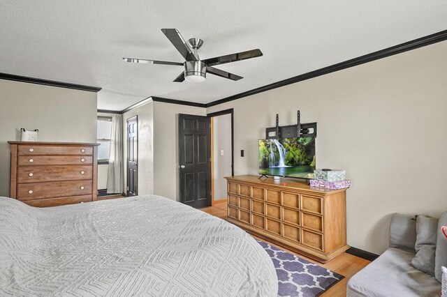 93 Lincoln Ave, Ashburnham, MA 01430 - bedroom with ornamental molding, wood finished floors, a textured ceiling, and a ceiling fan