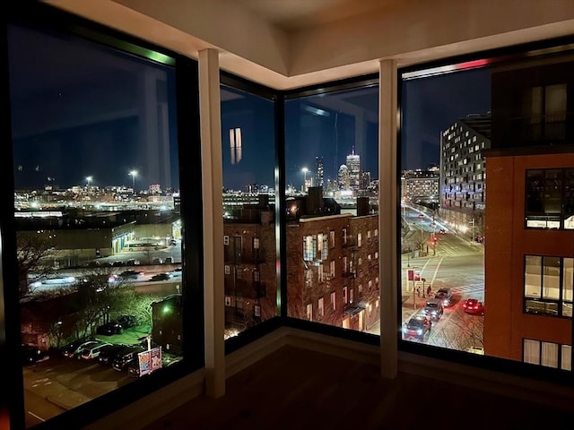 entryway featuring a view of city lights