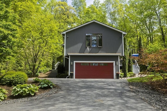 21 Birch Ln, Northampton, MA 01062 - view of front of property with driveway and an attached garage