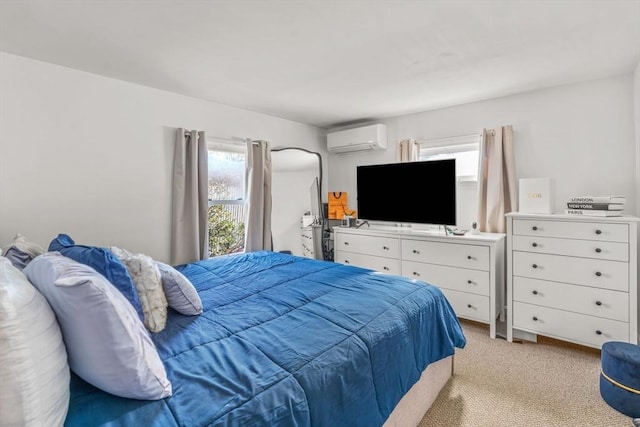 bedroom with light carpet and an AC wall unit